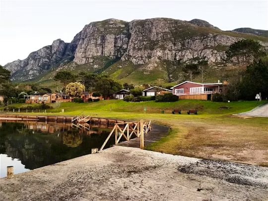 Lagoon Edge holiday homes with mountain backdrop and lagoon views